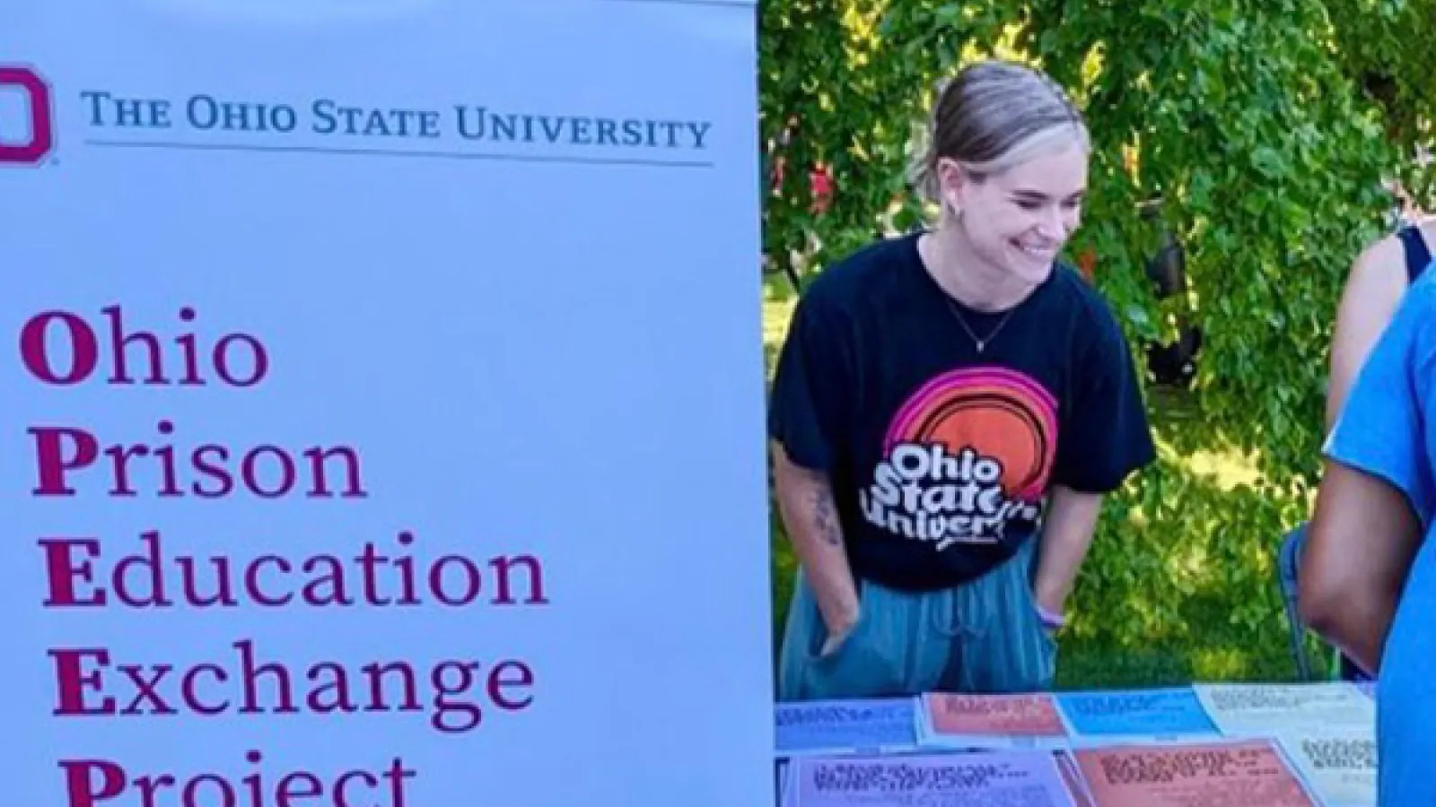 Program Coordinator Nicole Edgerton smiles at the Columbus campus student involvement fair.
