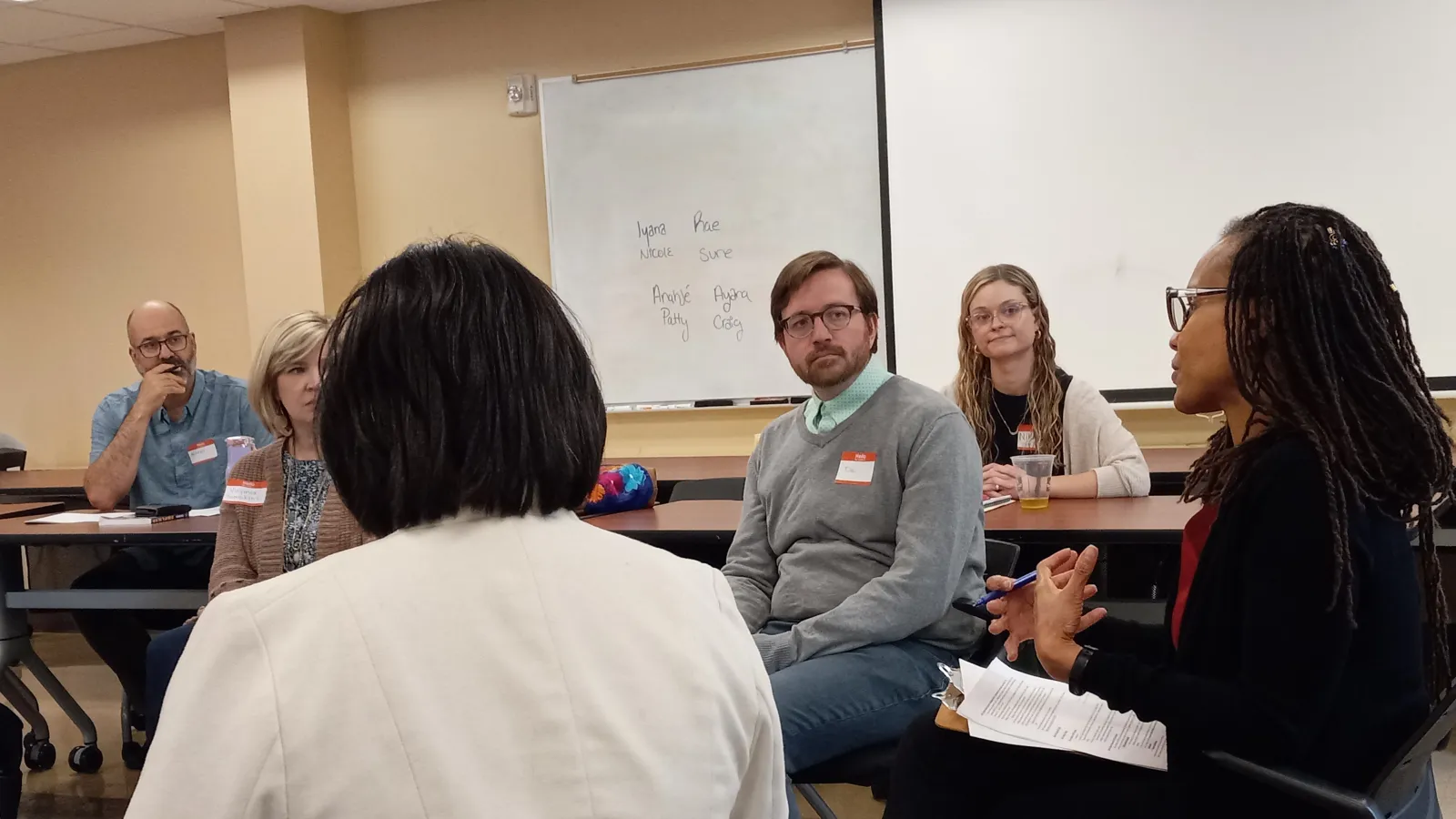 Discussion amongst participants in a "fishbowl" classroom exercise during OPEEP's May 2023 Instructor Training.